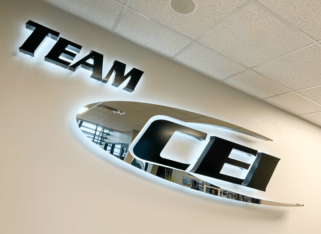 Team CEI logo on a wall